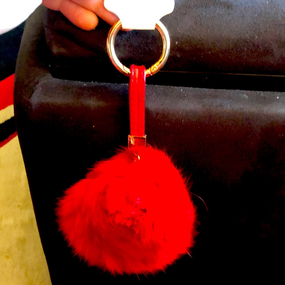 Bag accessory red pom